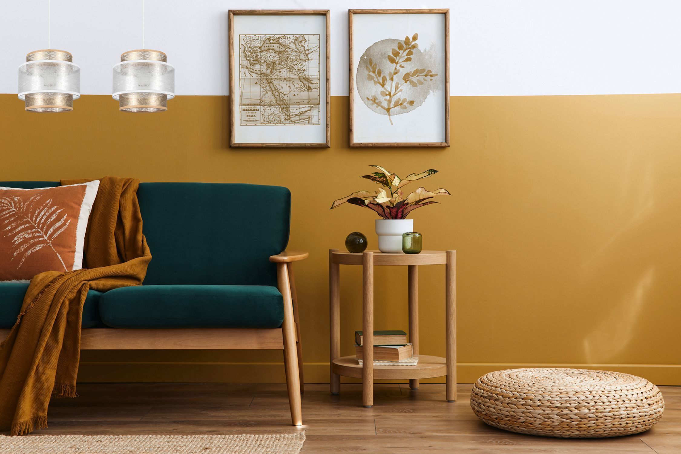sofa, teal sofa, wooden frame, gold wall, potted plant