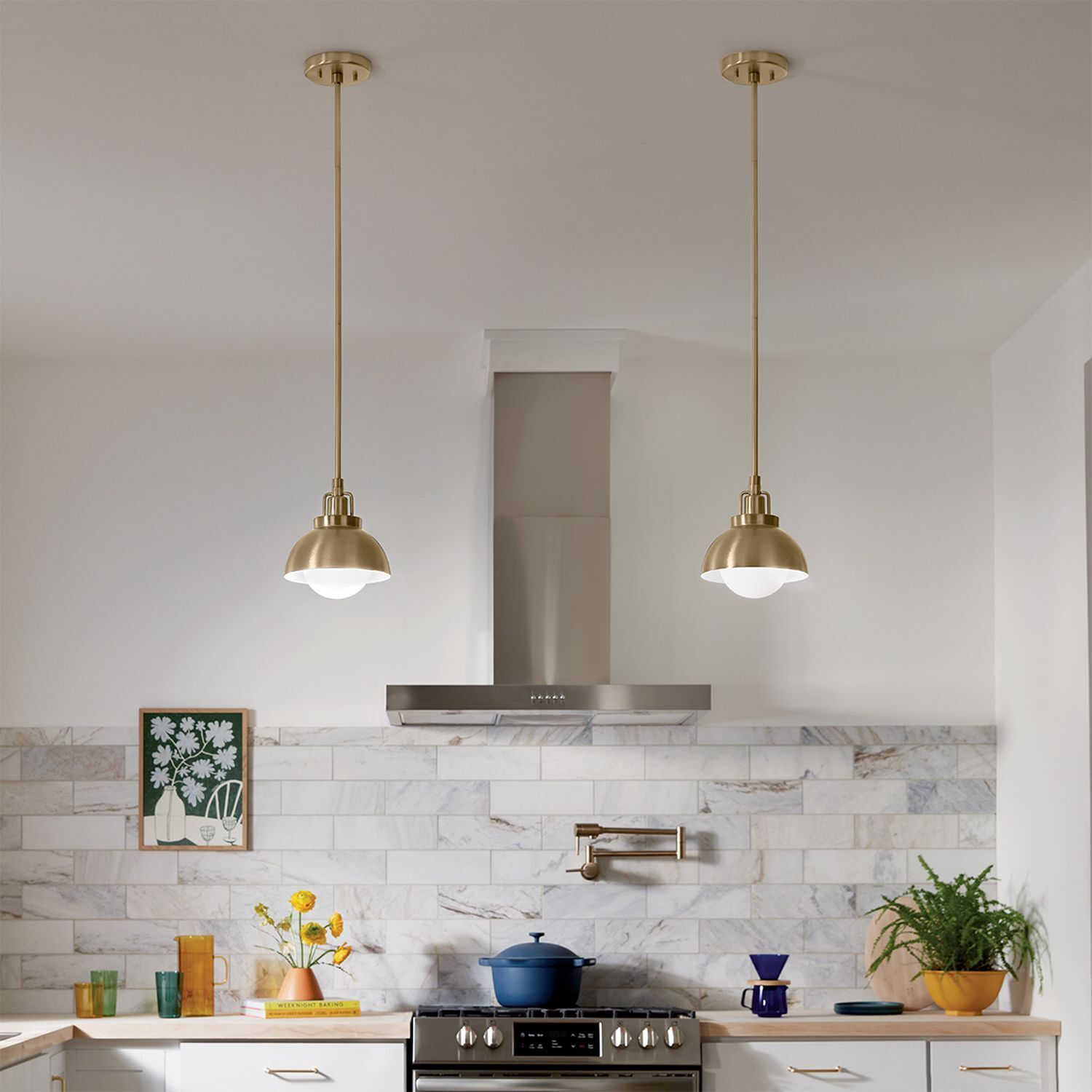 9563e003d8c9407db0cb9e16852e2734 kitchen, pendant lights, stove, brass, tile backsplash