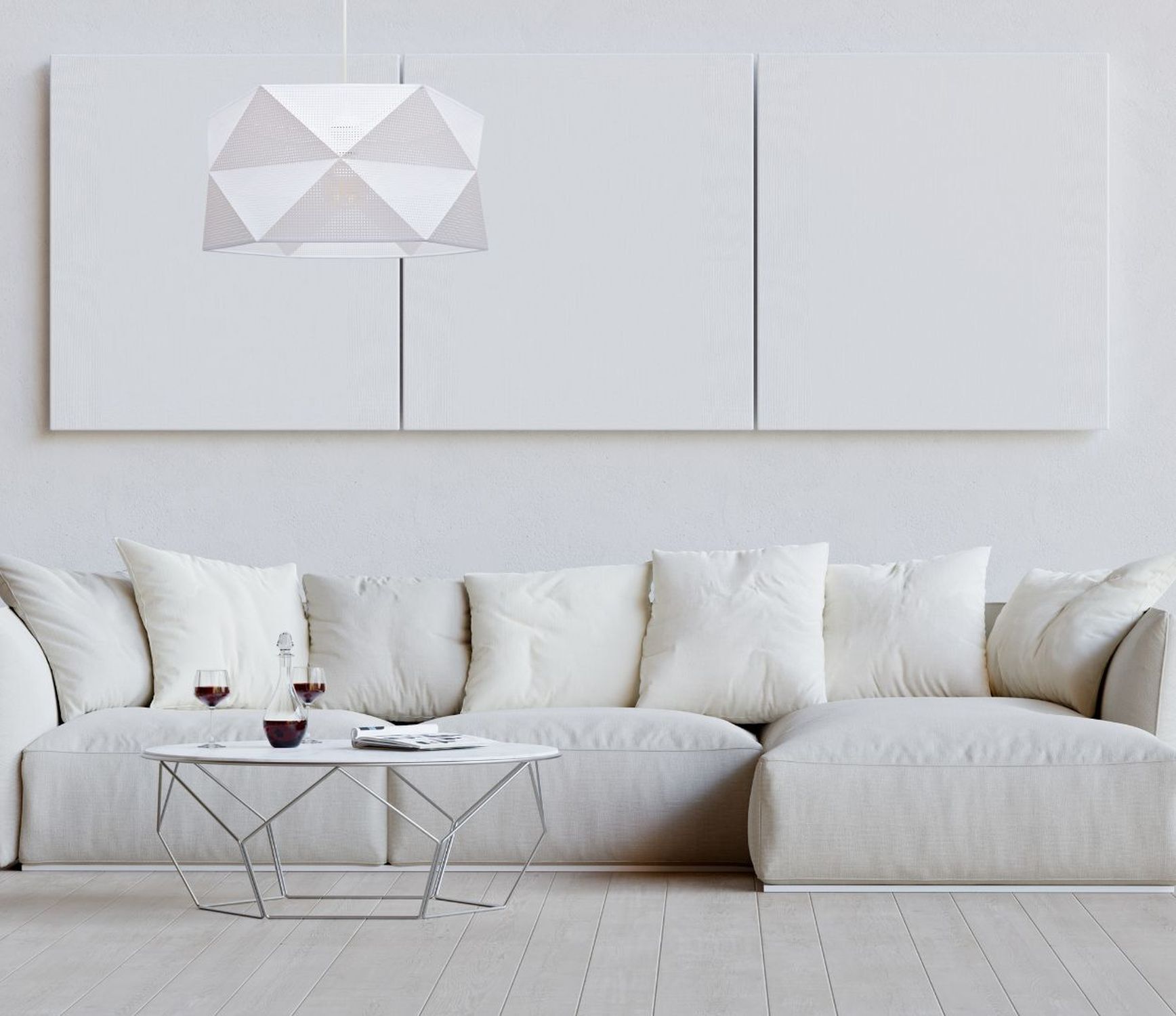 wohnzimmer, sofa, weiße einrichtung, tisch aus metall, wandlampe geometrisch